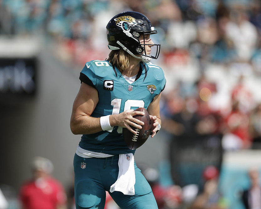 Trevor Lawrence dropping back to pass